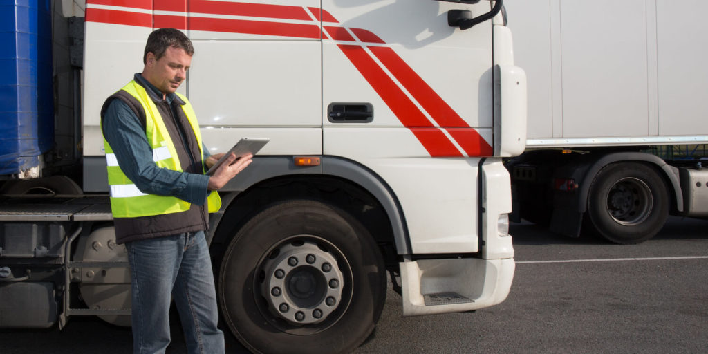 Lorry driver with clipboard